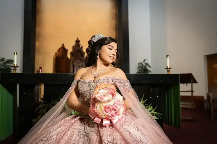 Quinceañera portrait holding bouquet Carlsbad NM